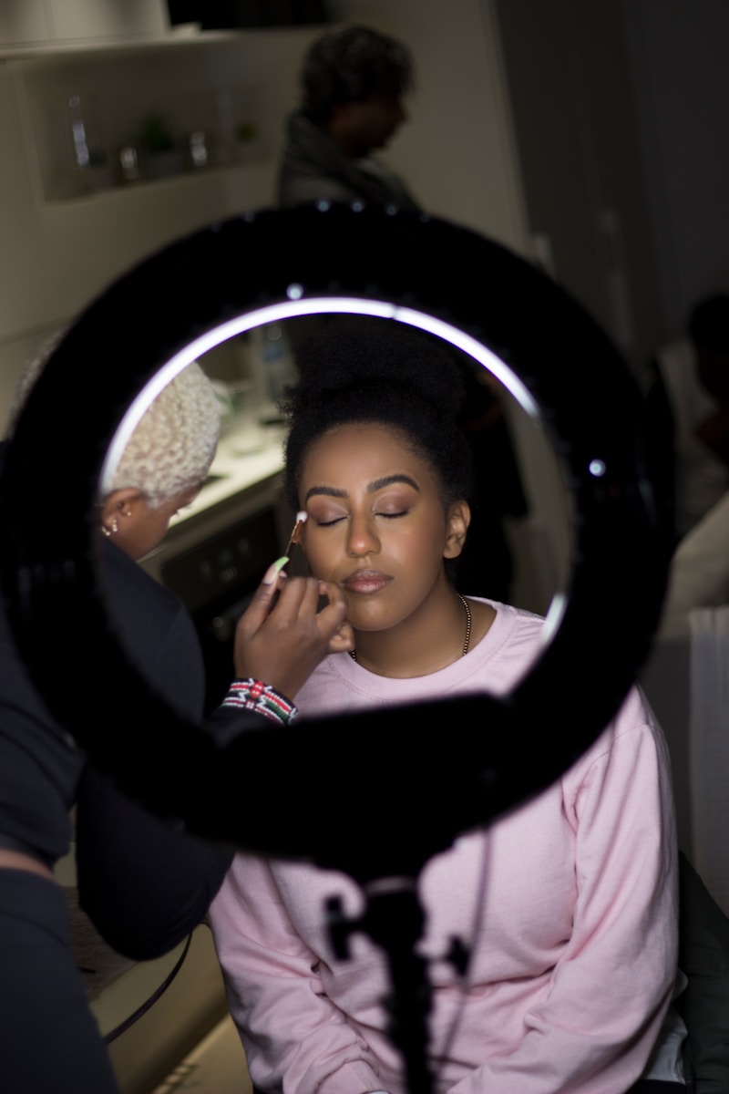 Photo by Harry Truong girl in pink shirt holding her face